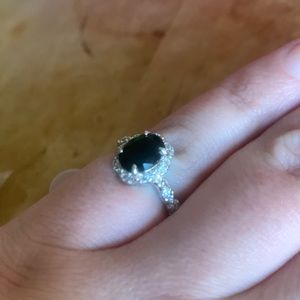 Dark Emerald, rhodium plating. size 7.